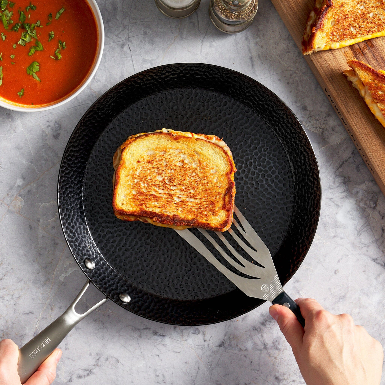 Milk Street 11-Inch Hammered Carbon Steel Skillet Cookware & Tools Milk Street 