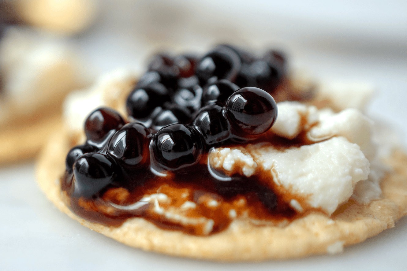 In a nod to modern food trends in molecular gastronomy, family producer Acetaia Leonardi in Modena, Italy, uses a gelling agent to encapsulate the classic sweet-tart acidity of balsamic vinegar in these innovative pearls, which make tasting balsamic a more vivid and intense experience.