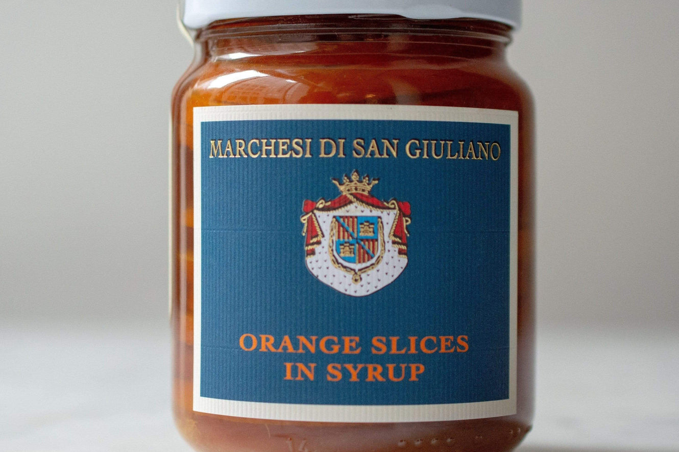 To these orange slices in syrup, organic blood oranges are hand-picked from the producer's own orchards, sliced finely with the rind still on, then briefly blanched to remove some of their bitterness and carefully layered in jars.