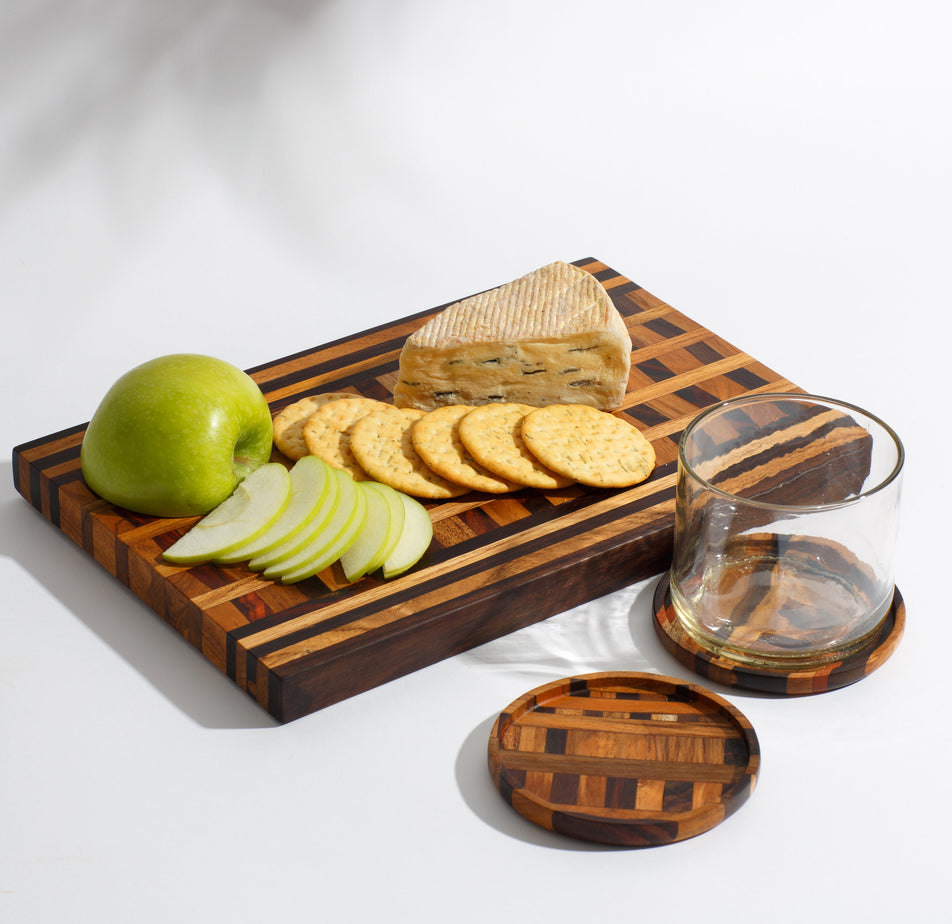 https://store.177milkstreet.com/cdn/shop/products/paguro-upcycle-circle-handcrafted-rubber-coaster-set-of-4-housewares-paguro-upcycle-555085_476x462_crop_center@2x.jpg?v=1648219791